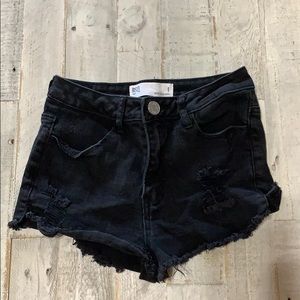 Black ripped denim shorts